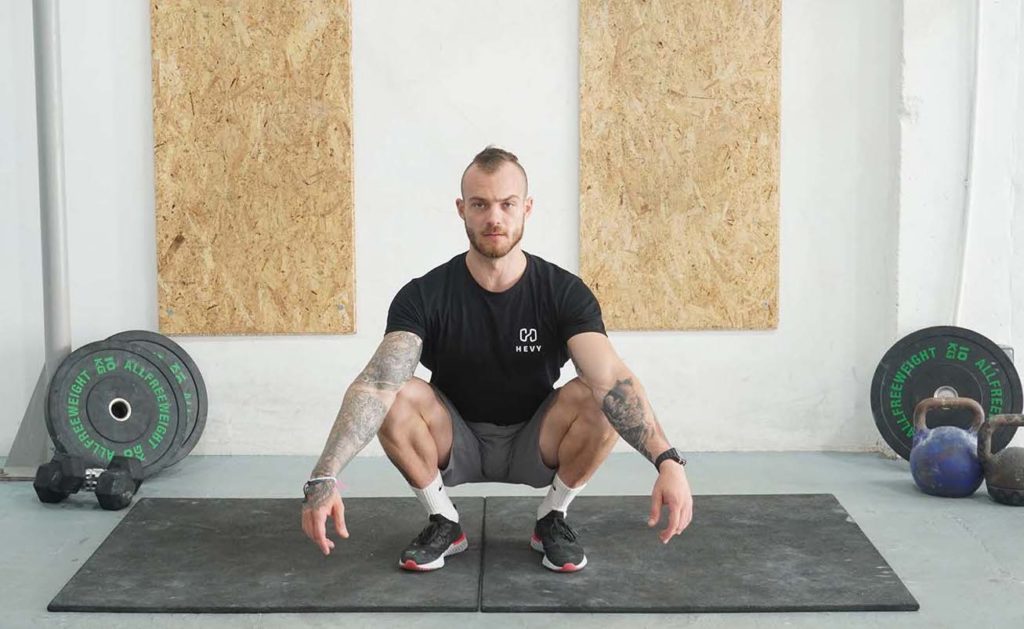 man deep squat